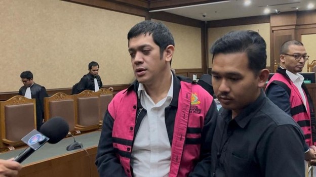 Muhamad Kerry Adrianto Riza, anak Riza Chalid, usai menjalani persidangan di Pengadilan