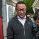 Tersangka kasus dugaan korupsi kuota haji, Ishfah Abidal Aziz alias Gus Alex, usai menjalani pemeriksaan di Gedung KPK, Jakarta.