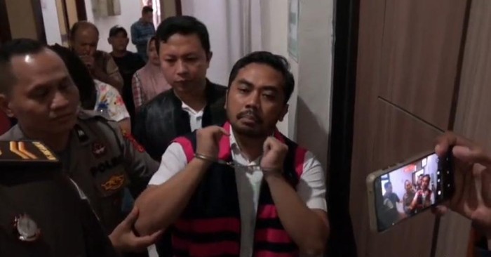 Terdakwa Amsal Sitepu saat berada di Pengadilan Negeri Medan dalam proses persidangan.